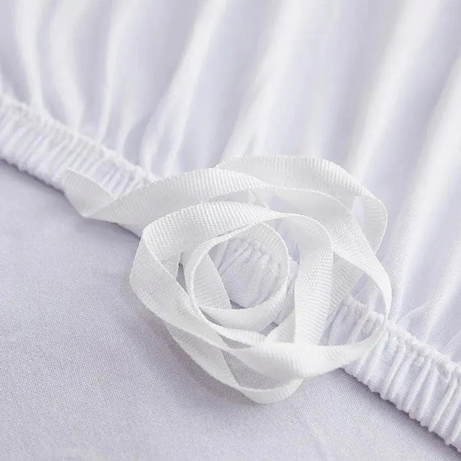 housse-de-canape-extensible-universelle-blanc – La Maison de la Housse